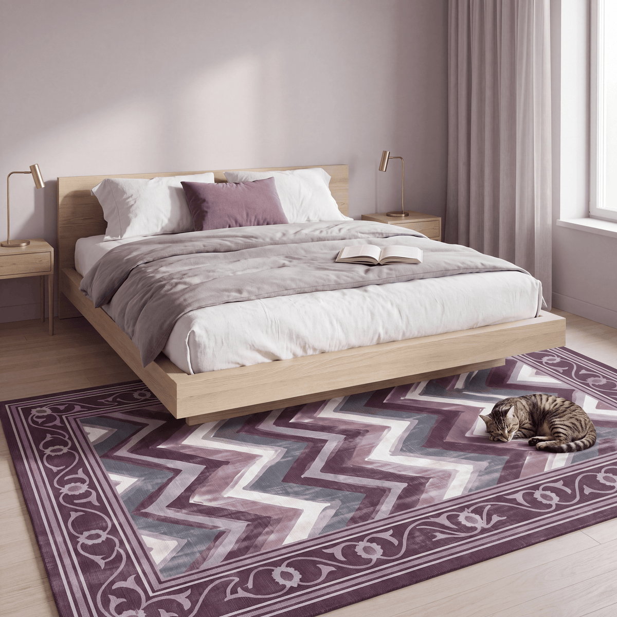 The rug at the foot of a bed with a cat asleep on it.