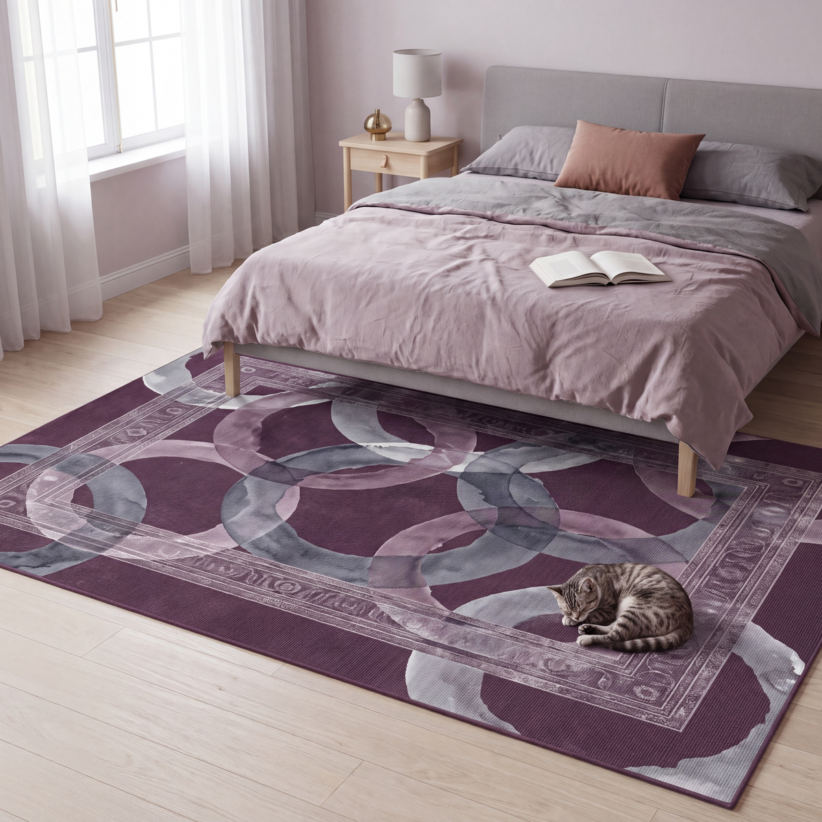 The rug at the foot of a bed with a cat asleep on it.