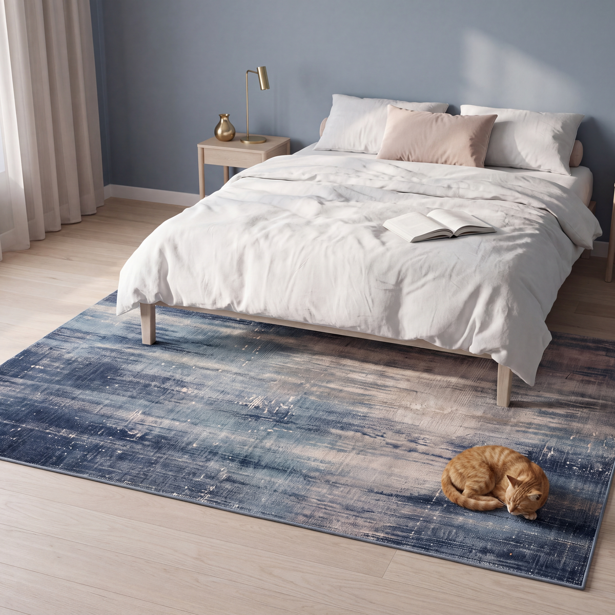 The rug at the foot of a bed with a cat asleep on it.