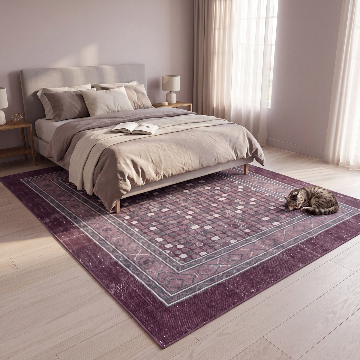 The rug at the foot of a bed with a cat asleep on it.