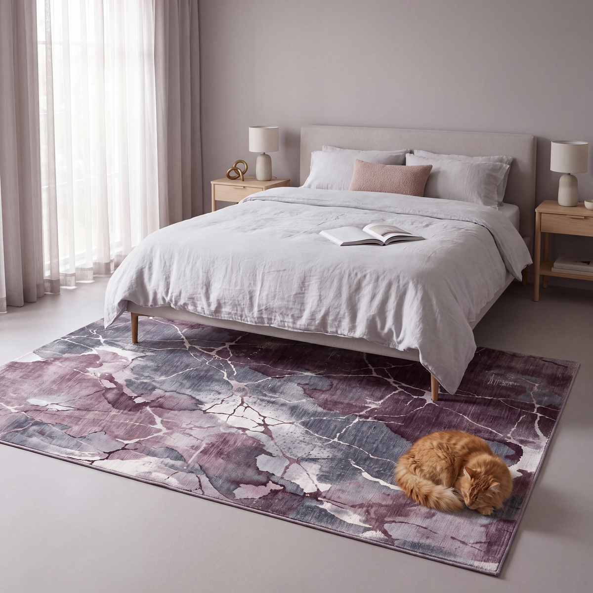 The rug at the foot of a bed with a cat asleep on it.