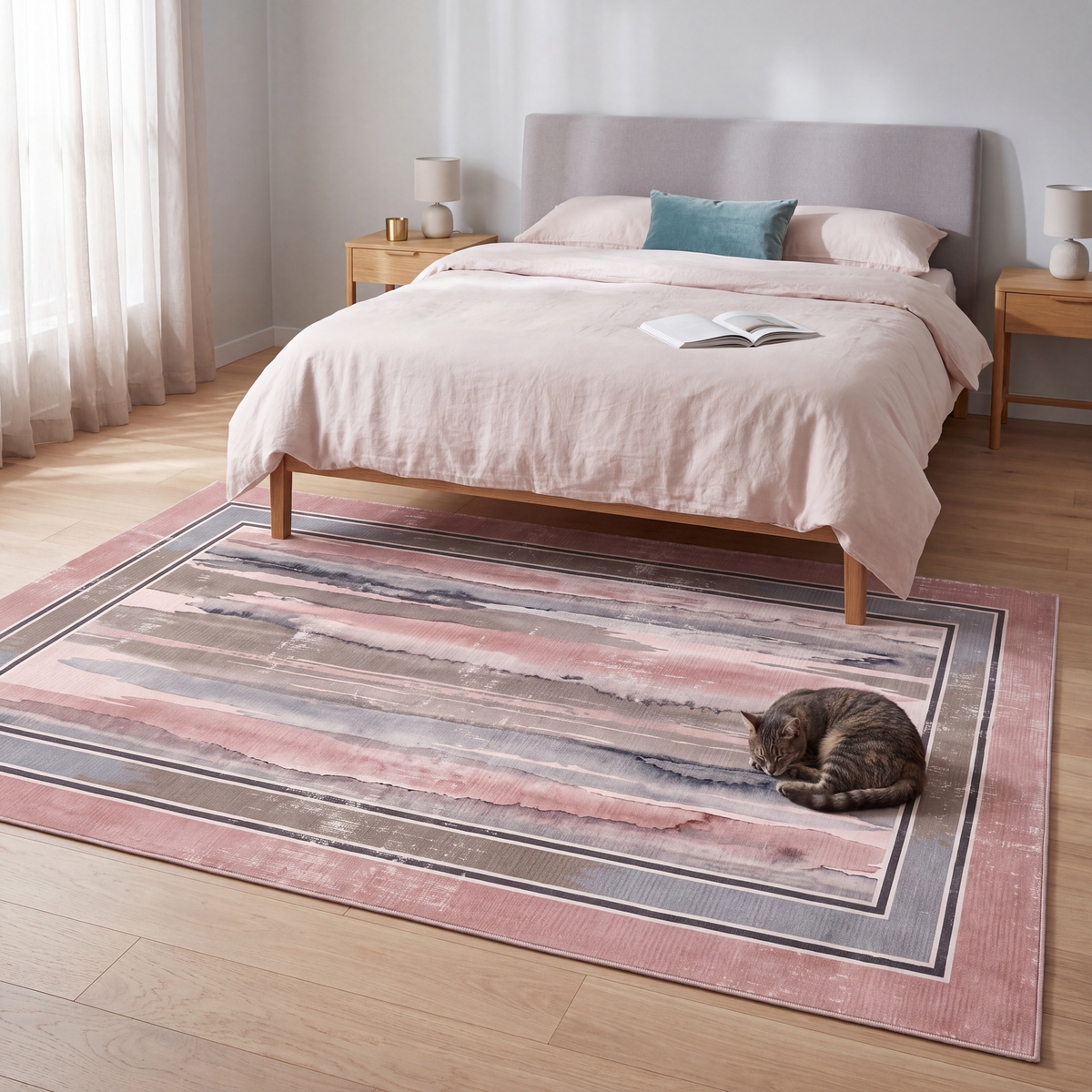 The rug at the foot of a bed with a cat asleep on it.