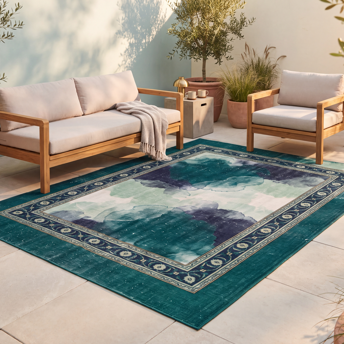 The rug laid flat on a patio beside outdoor seating.