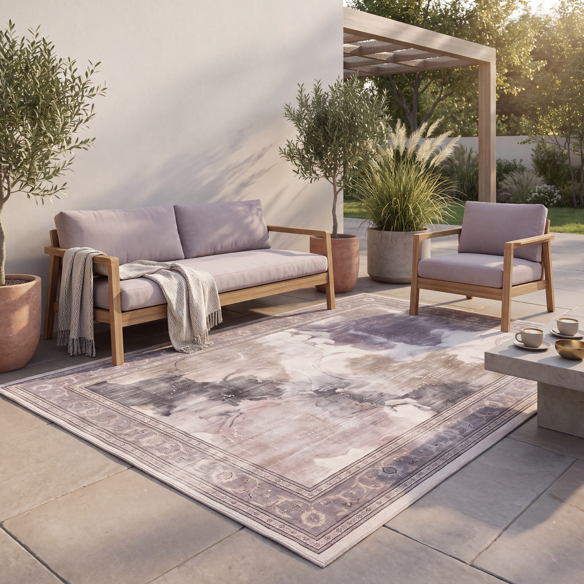 The rug laid flat on a patio beside outdoor seating.