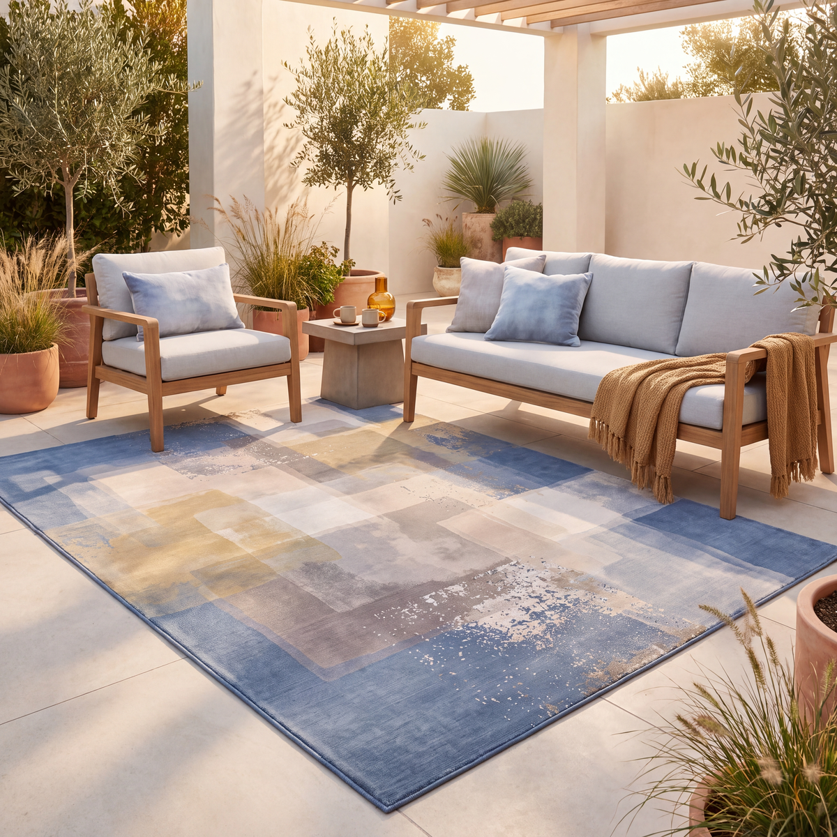 The rug laid flat on a patio beside outdoor seating.