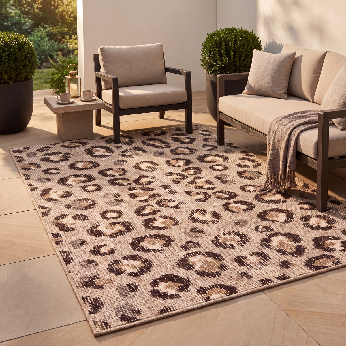 The rug laid flat on a patio beside outdoor seating.
