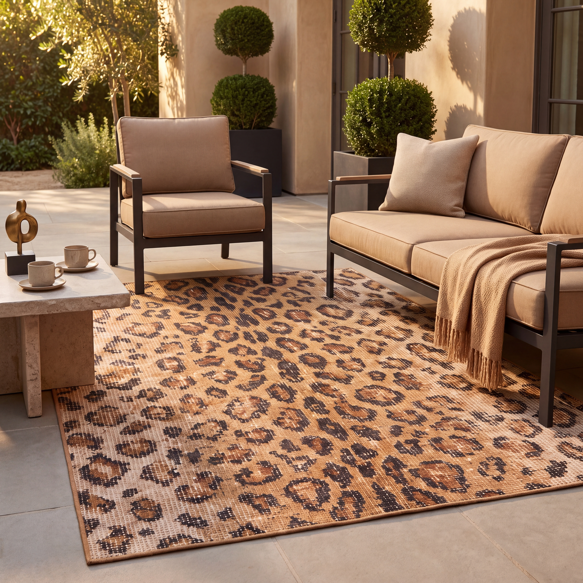 The rug laid flat on a patio beside outdoor seating.