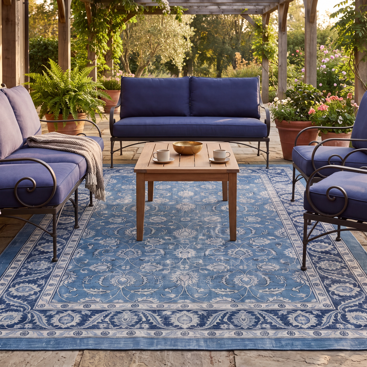 The rug laid flat on a patio beside outdoor seating.