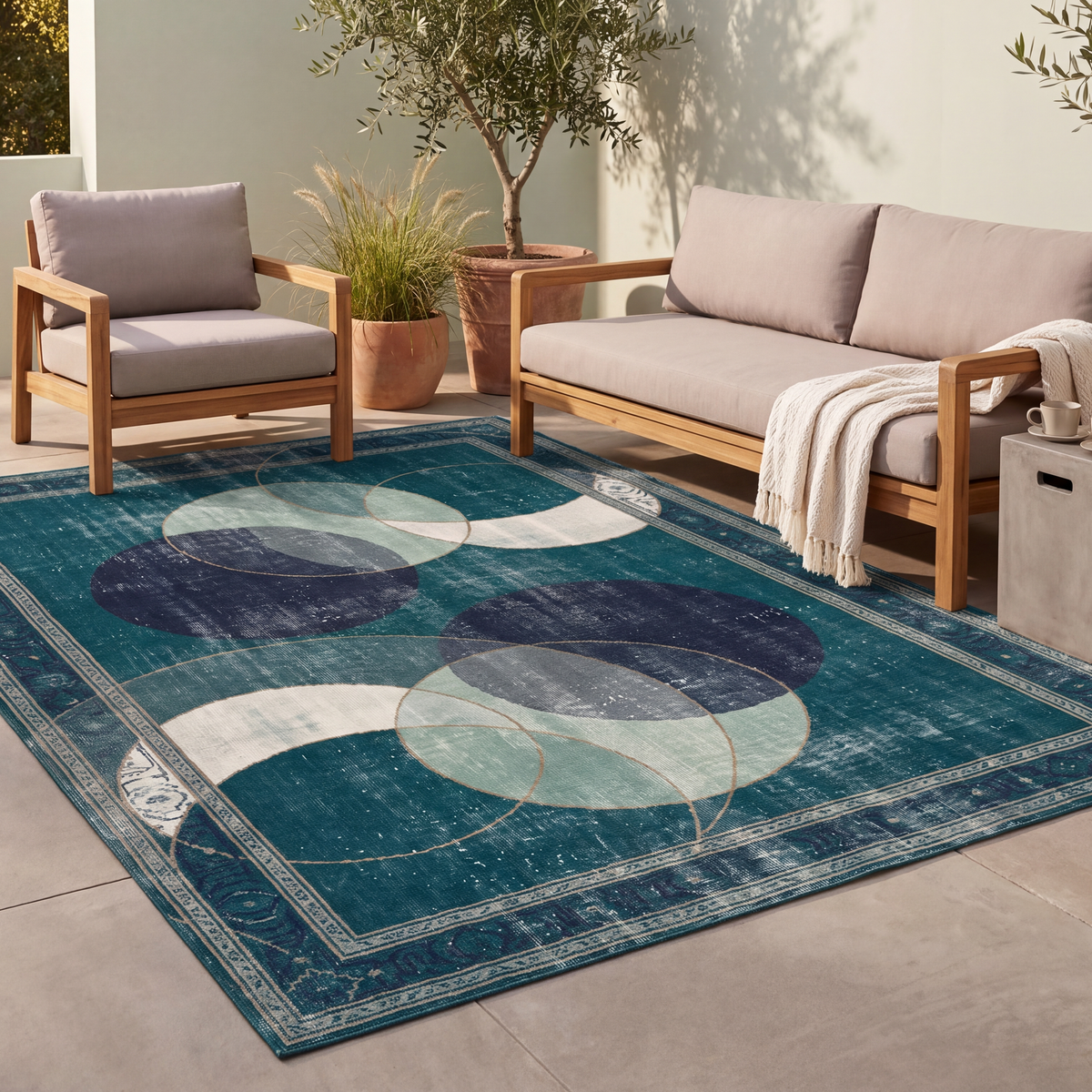 The rug laid flat on a patio beside outdoor seating.