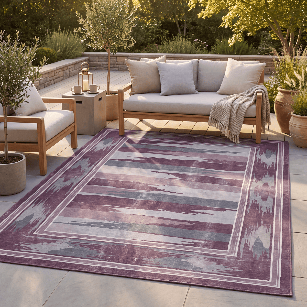 The rug laid flat on a patio beside outdoor seating.